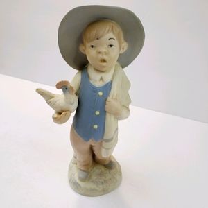Hummelwerk ceramic figurine boy holding chicken